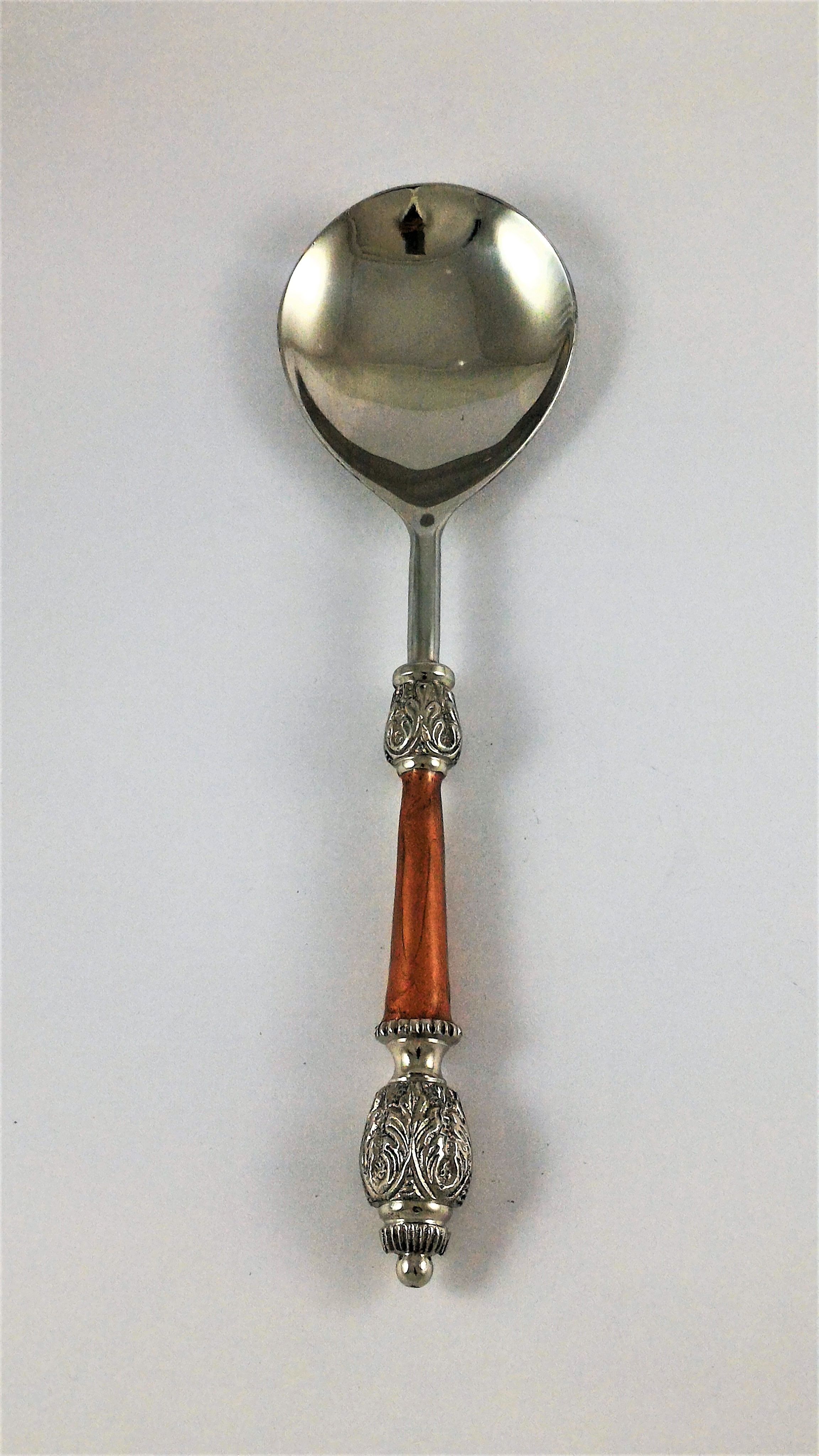 Serving spoon with copper color